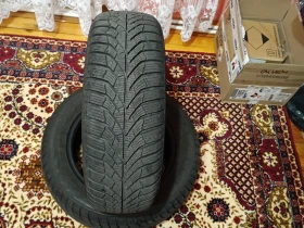 Гуми Зимни 185/60R14, снимка 1 - Гуми и джанти - 47943183