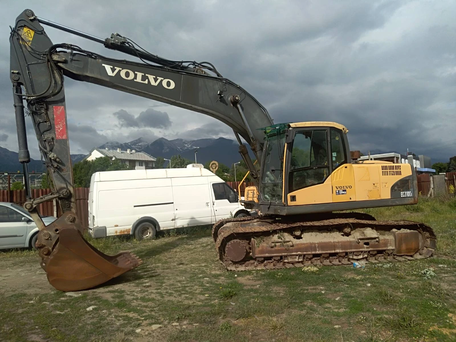 Багер Volvo EC210