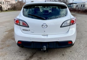     Mazda 3 1, 6