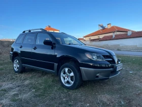 Mitsubishi Outlander 2.4i, снимка 8