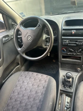 Opel Astra Комби, снимка 8