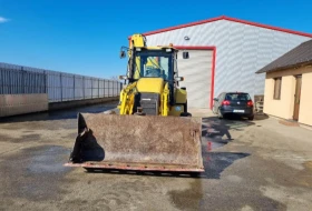 Багер Komatsu WB 97R2A, снимка 9