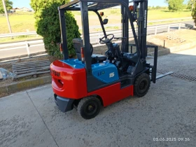      Komatsu   