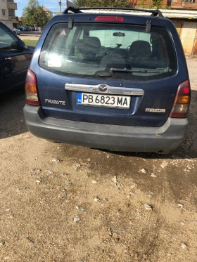 Mazda Tribute - 2600 € / 5085.16 лв. - 62249844 5