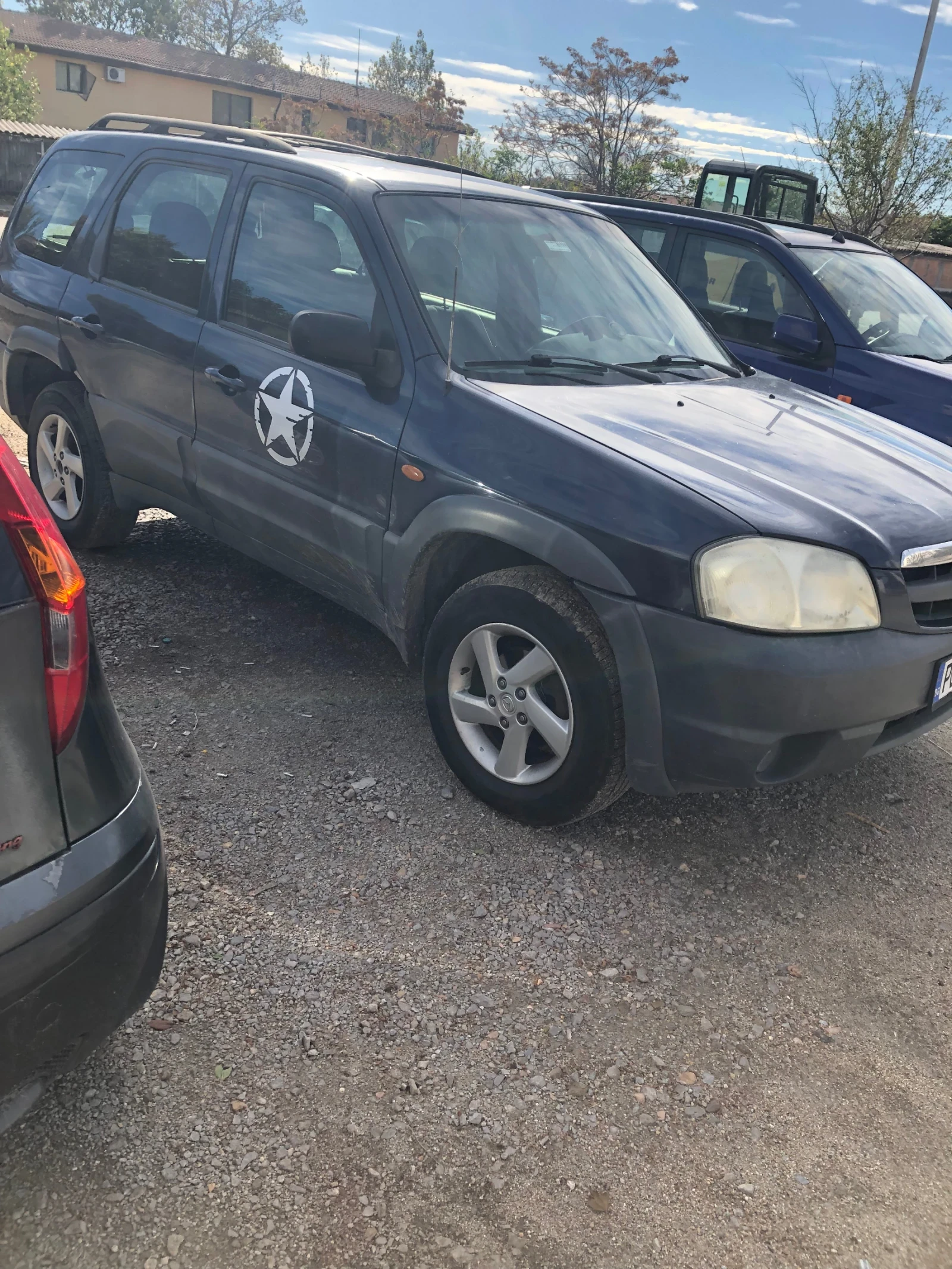 Mazda Tribute, снимка 4 - Автомобили и джипове - 53989827