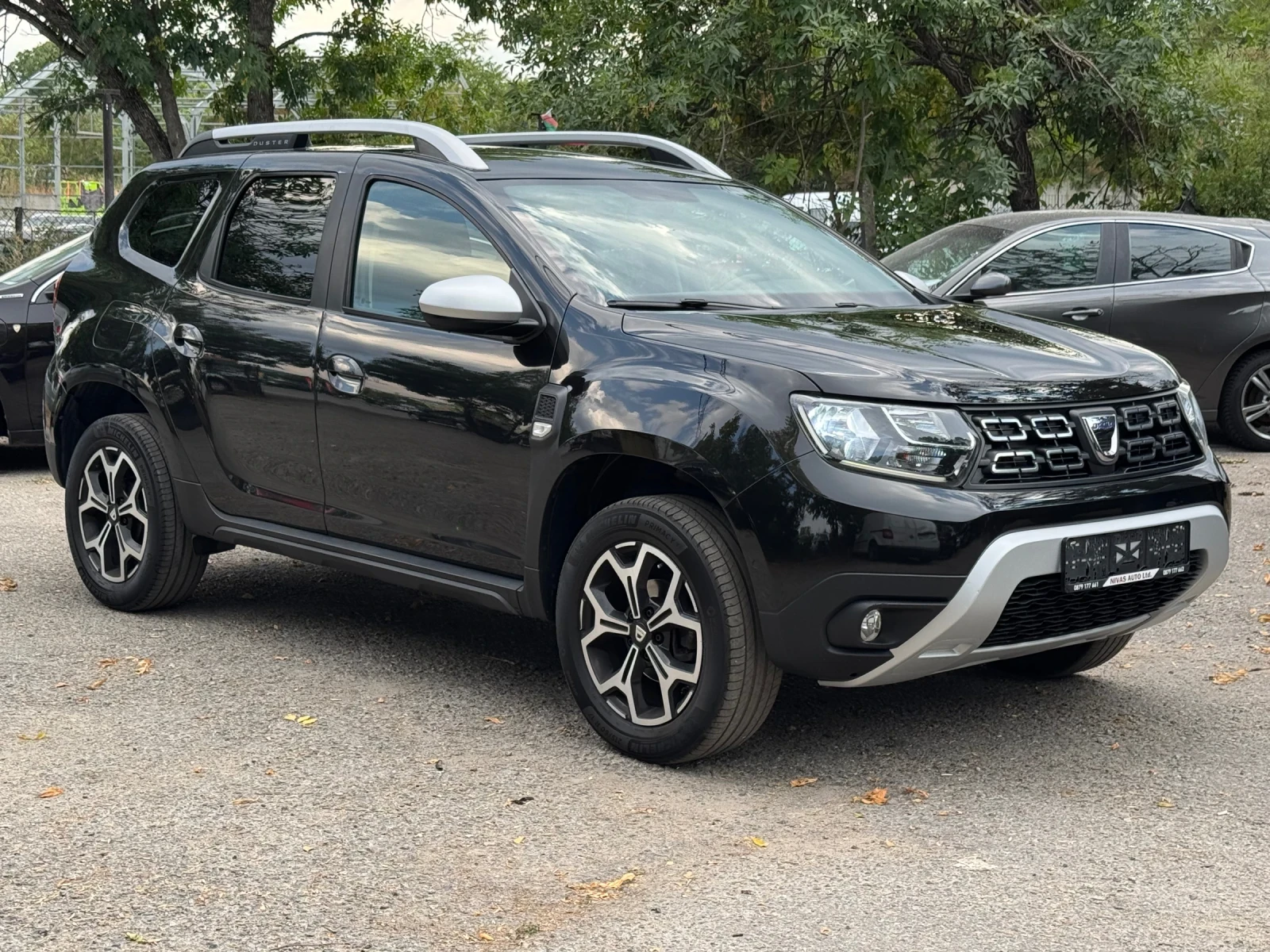Dacia Duster 1.6i Фабричен Газ! Нави!, снимка 7 - Автомобили и джипове - 55836791