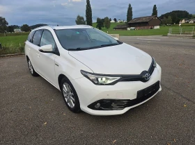 Toyota Auris 1.8 Хибрид-Комби-2 бр, снимка 1