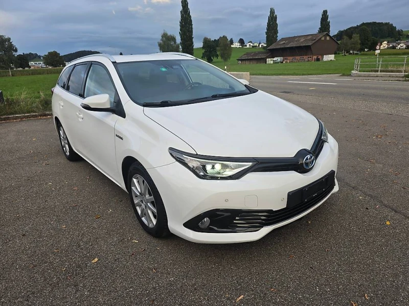 Toyota Auris 1.8 Хибрид-Комби-2 бр, снимка 1 - Автомобили и джипове - 48394767