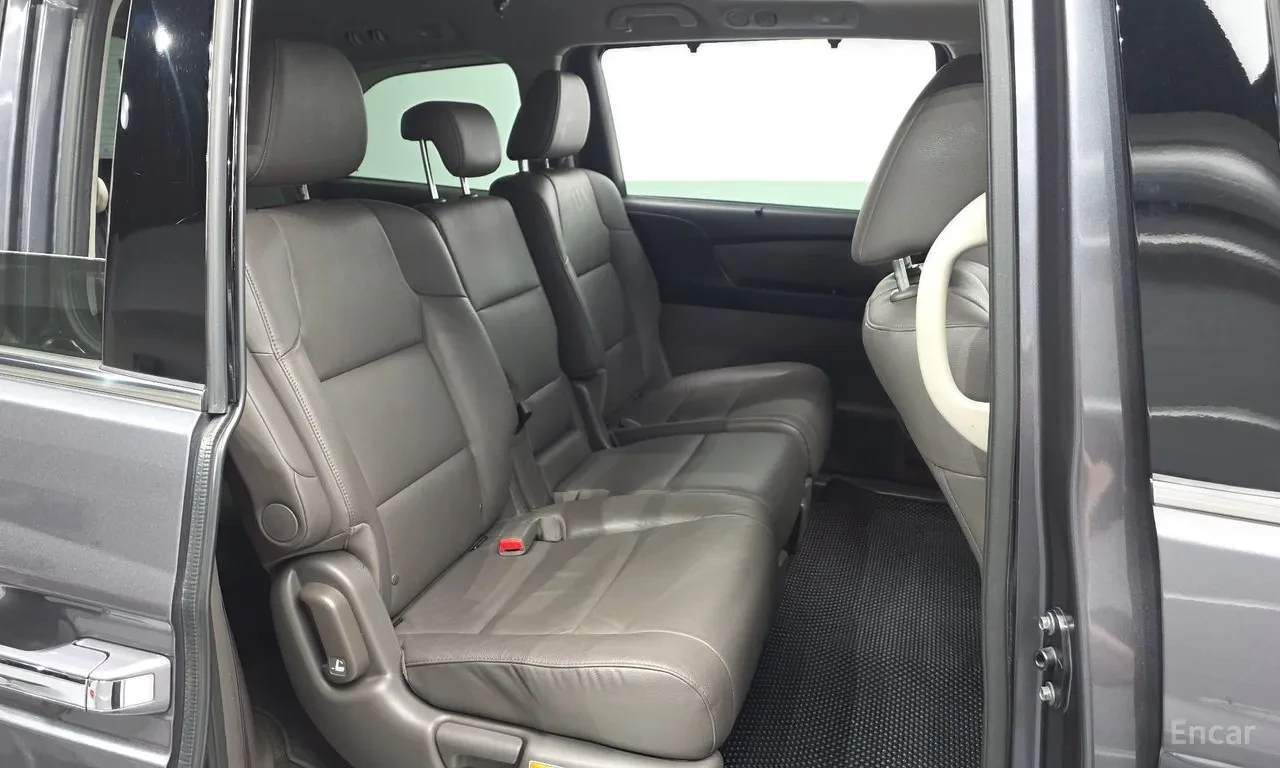 Honda Odyssey 3.5 V6 i-VTEC * 7 МЕСТА * СИВ КОЖЕН САЛОН * КАМЕРА, снимка 14 - Автомобили и джипове - 55437638