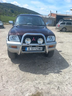 Mitsubishi L200 Спешно, снимка 1