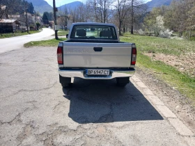 Nissan Navara 2.7 TD - 9200 € / 17993.64 лв. - 72309131 4