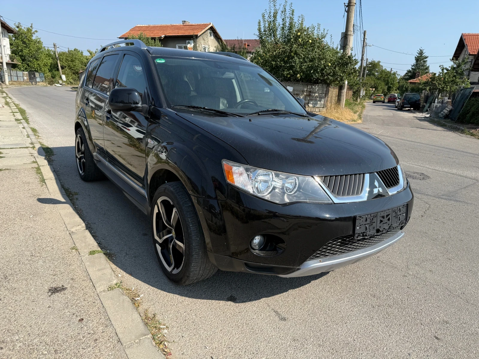 Mitsubishi Outlander 2.4i_4x4_7m - изображение 3