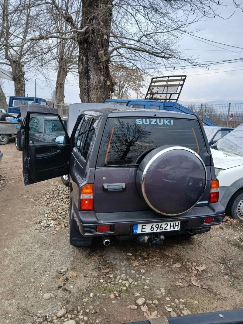 Suzuki Grand vitara, снимка 14 - Автомобили и джипове - 48814605