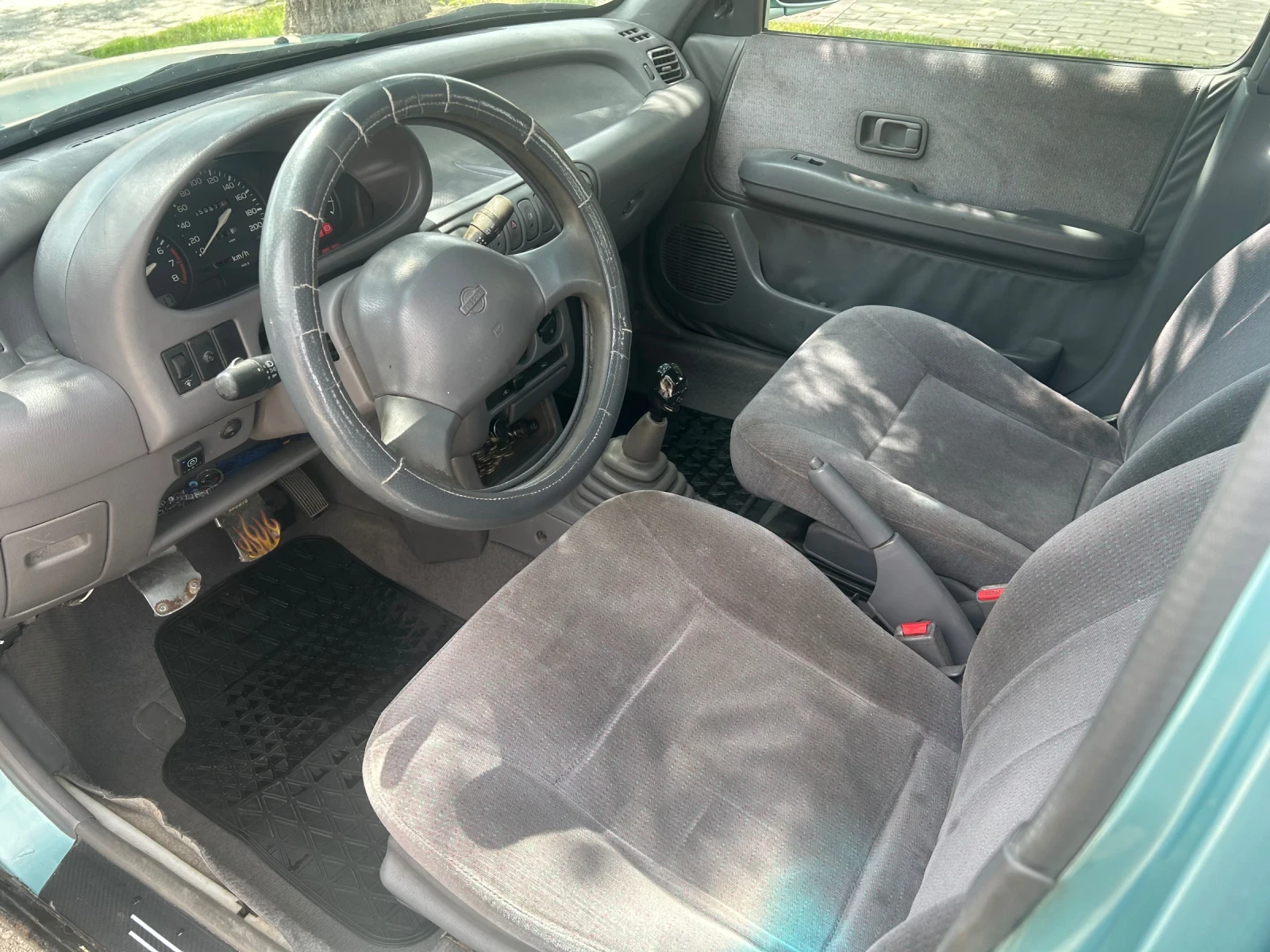 Nissan Micra 1.3 16 slx 75к.с - изображение 7