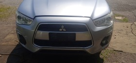 Mitsubishi ASX 1.8 дизел, снимка 11 - Автомобили и джипове - 41324941