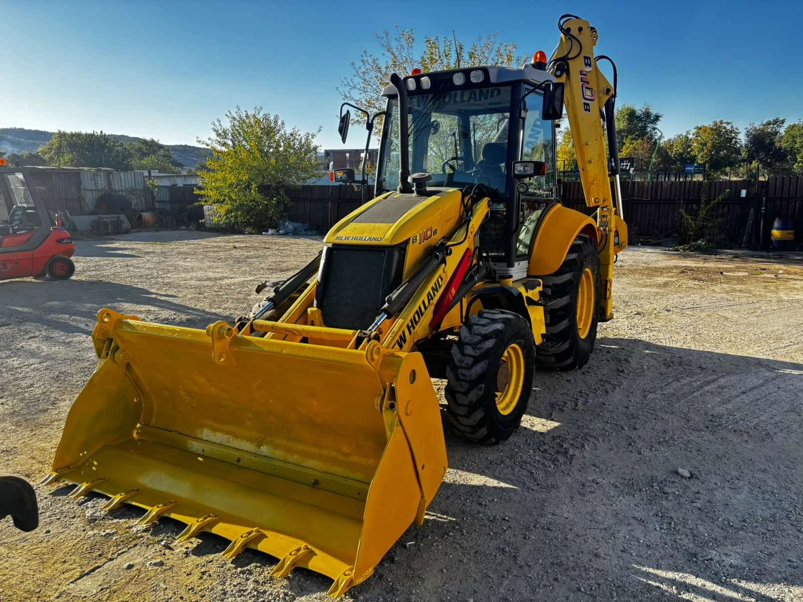 Багер New Holland B110 PS