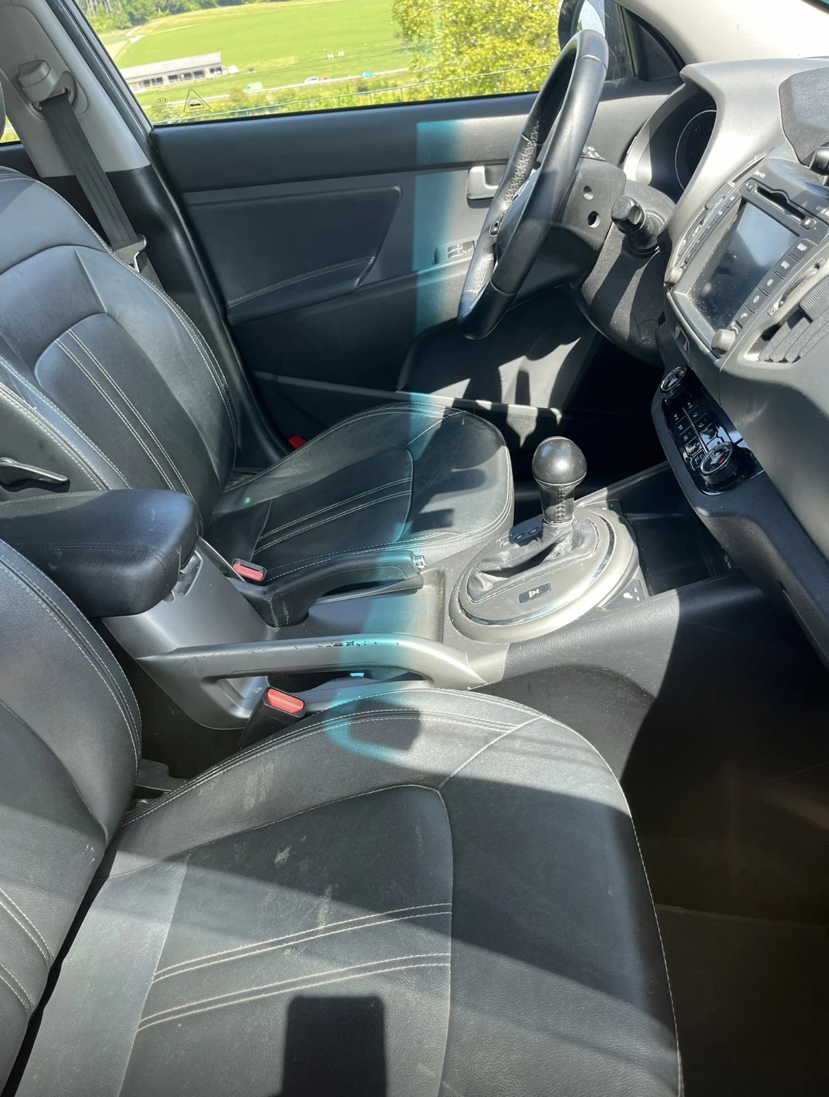 Kia Sportage 2.0 LUKS 4x4, снимка 12 - Автомобили и джипове - 54634781