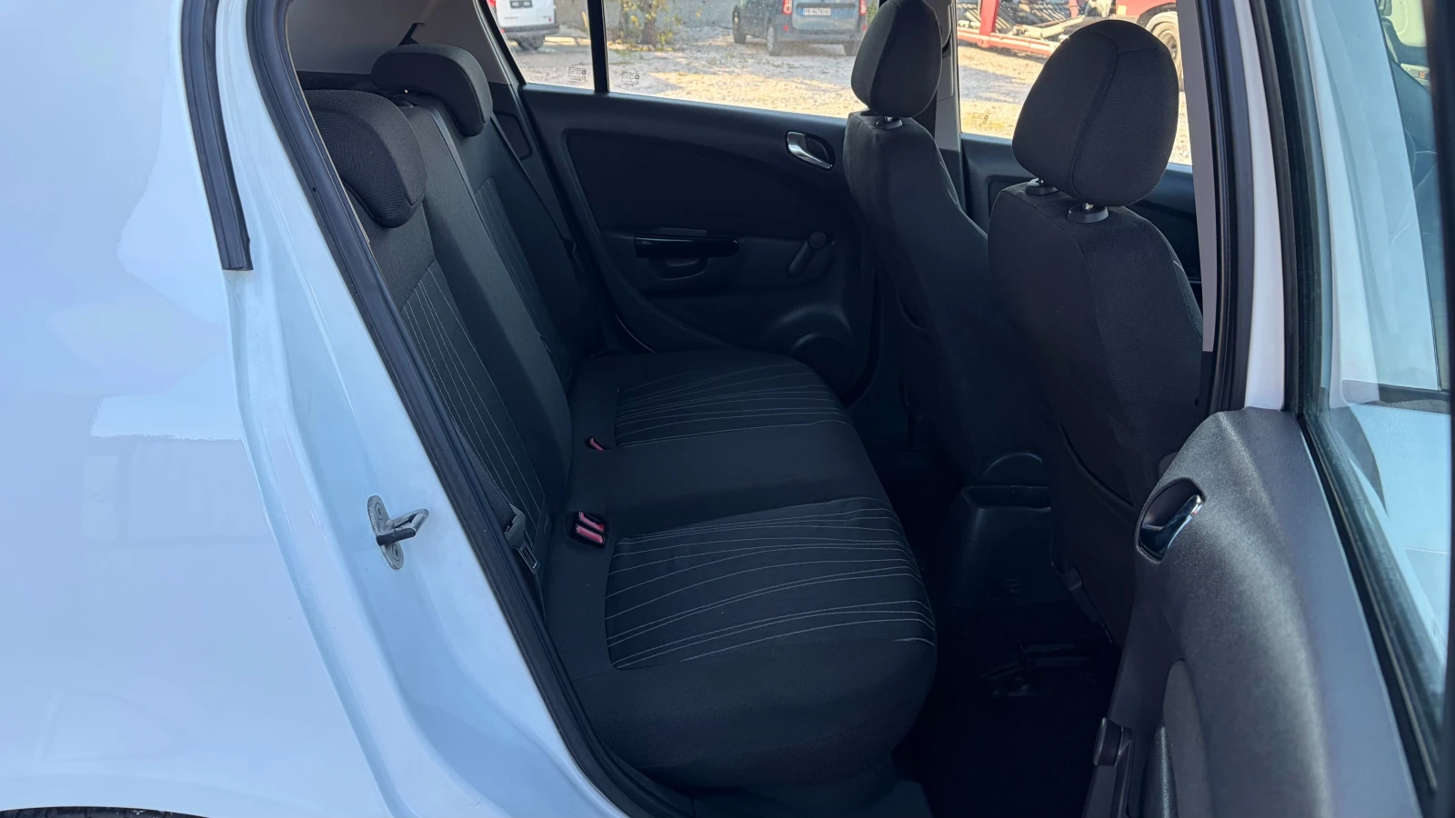 Opel Corsa 1.2i, снимка 11 - Автомобили и джипове - 56633258