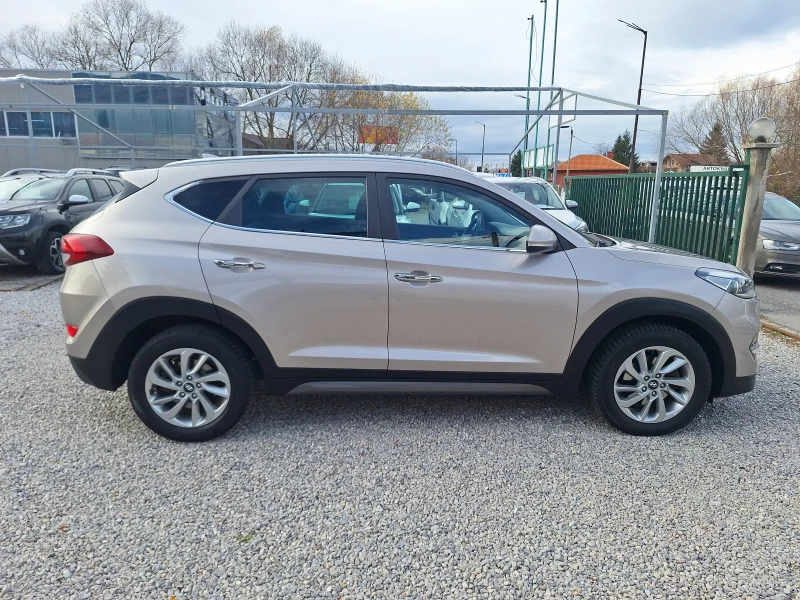 Hyundai Tucson 2.2crdi 136ks 4x4 Avtomat Koja Navi Full!, снимка 2 - Автомобили и джипове - 52537332