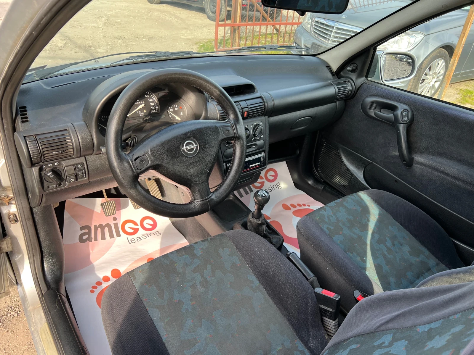 Opel Corsa 1.2i КЛИМАТИК/4 ЦИЛИНДЪРА, снимка 9 - Автомобили и джипове - 53904165