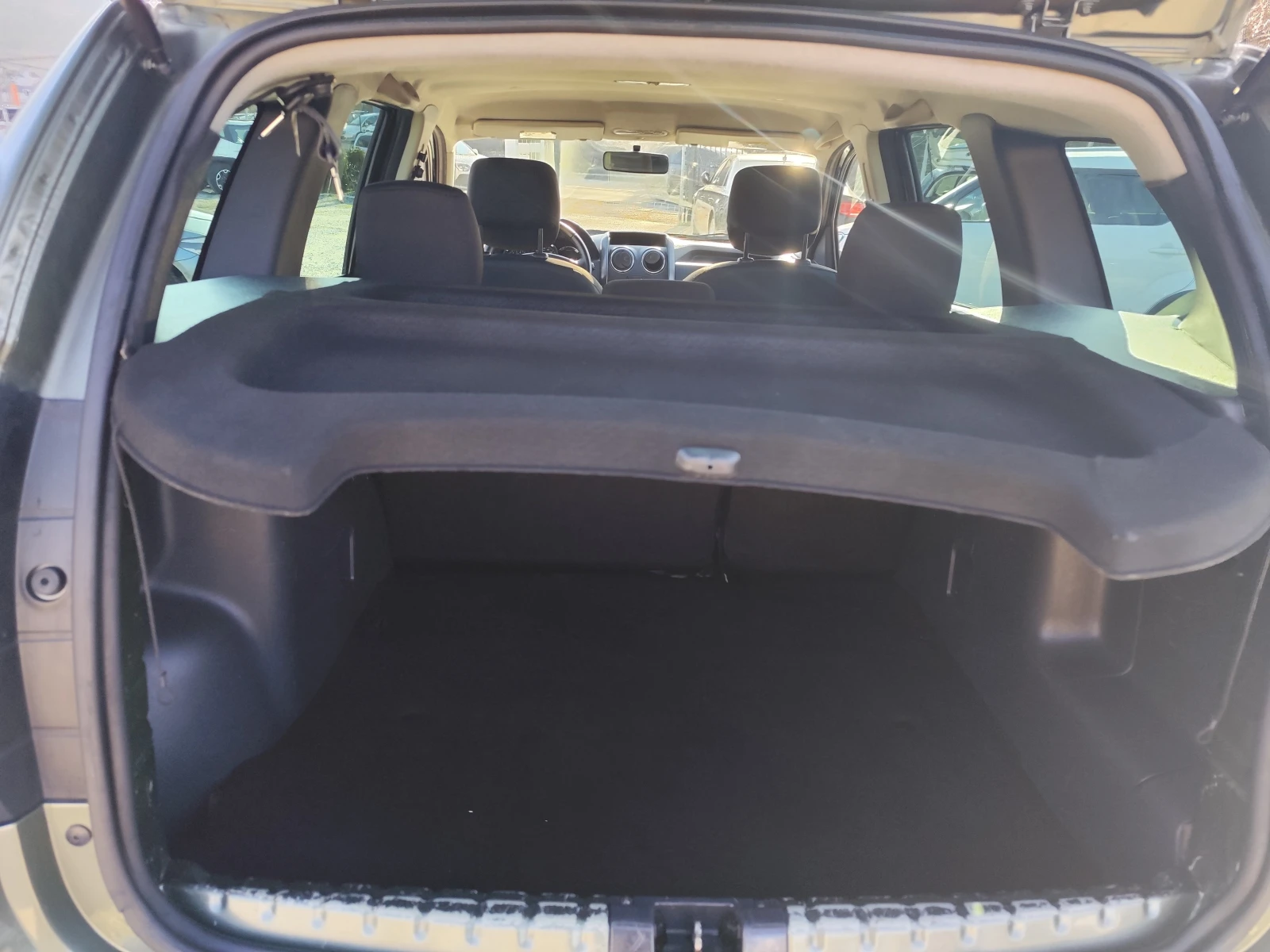 Dacia Duster 1.6i* ГАЗОВА УРЕДБА* EURO5B* KLIMA* , снимка 13 - Автомобили и джипове - 53746359