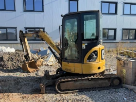      Cat 303C 