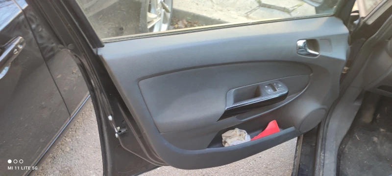 Opel Corsa 1.2, снимка 9 - Автомобили и джипове - 52776919