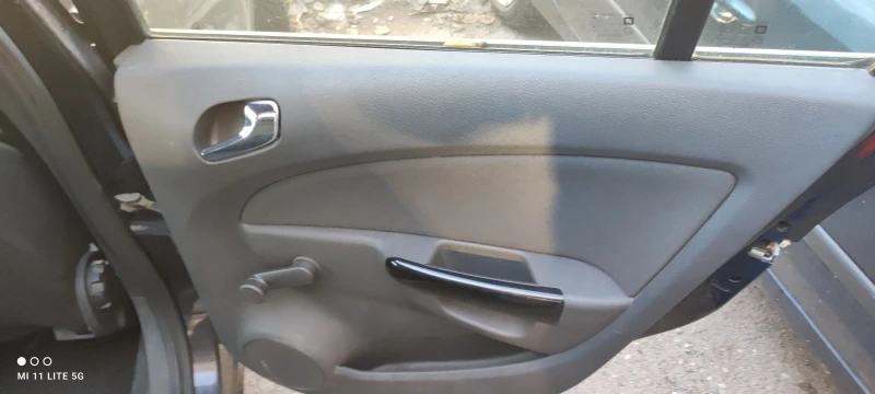Opel Corsa 1.2, снимка 13 - Автомобили и джипове - 52776919