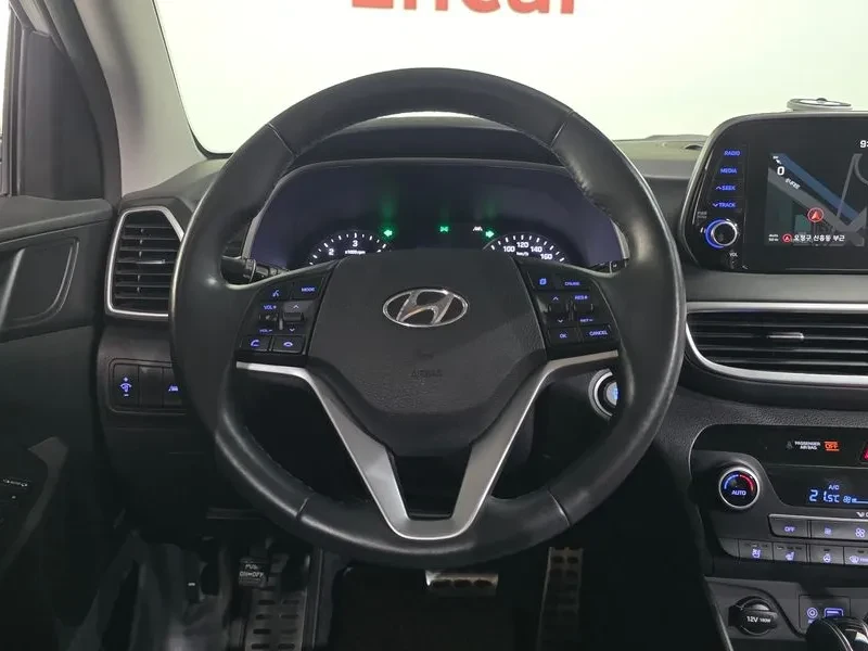 Hyundai Tucson DIESEL 1.6 2WD PREMIUM, снимка 12 - Автомобили и джипове - 55263722