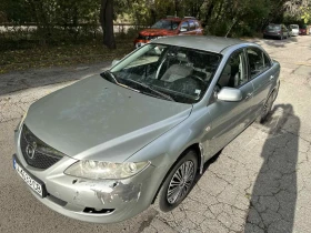 Mazda 6 2.0D / 121 к.с. / Климатроник / Печка / Парктроник - 2400 лв. / 1227.10 € - 45233437 4