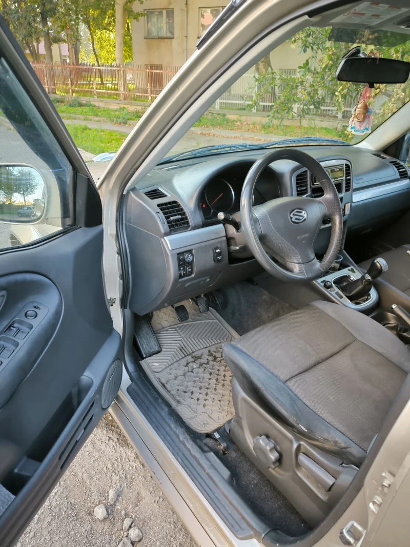 Suzuki Grand vitara, снимка 8 - Автомобили и джипове - 47660374