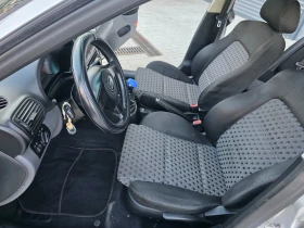 Seat Leon 1.9 TDI 110.k.c, снимка 14