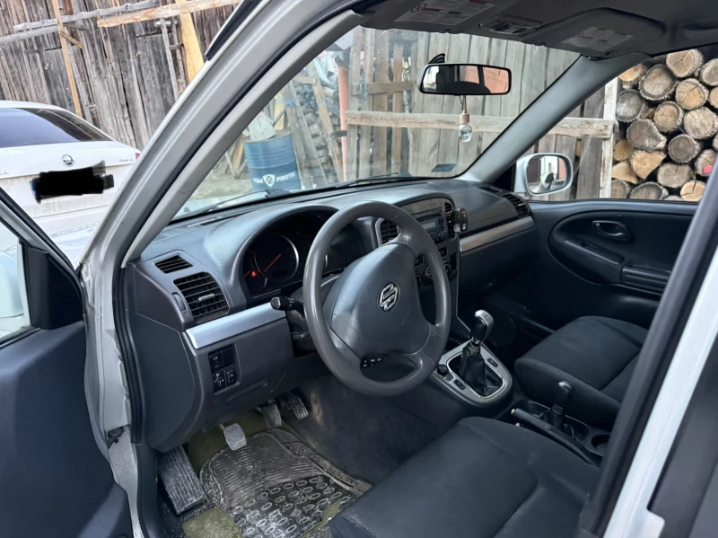 Suzuki Grand vitara 2.0-128 k.с., снимка 8 - Автомобили и джипове - 53203612
