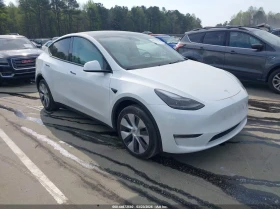 ������ Tesla Model Y