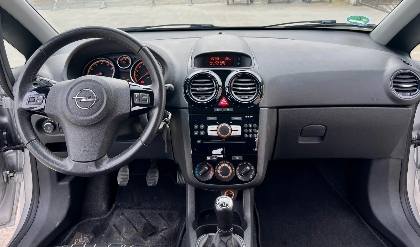 Opel Corsa D1.4, снимка 14 - Автомобили и джипове - 54210070