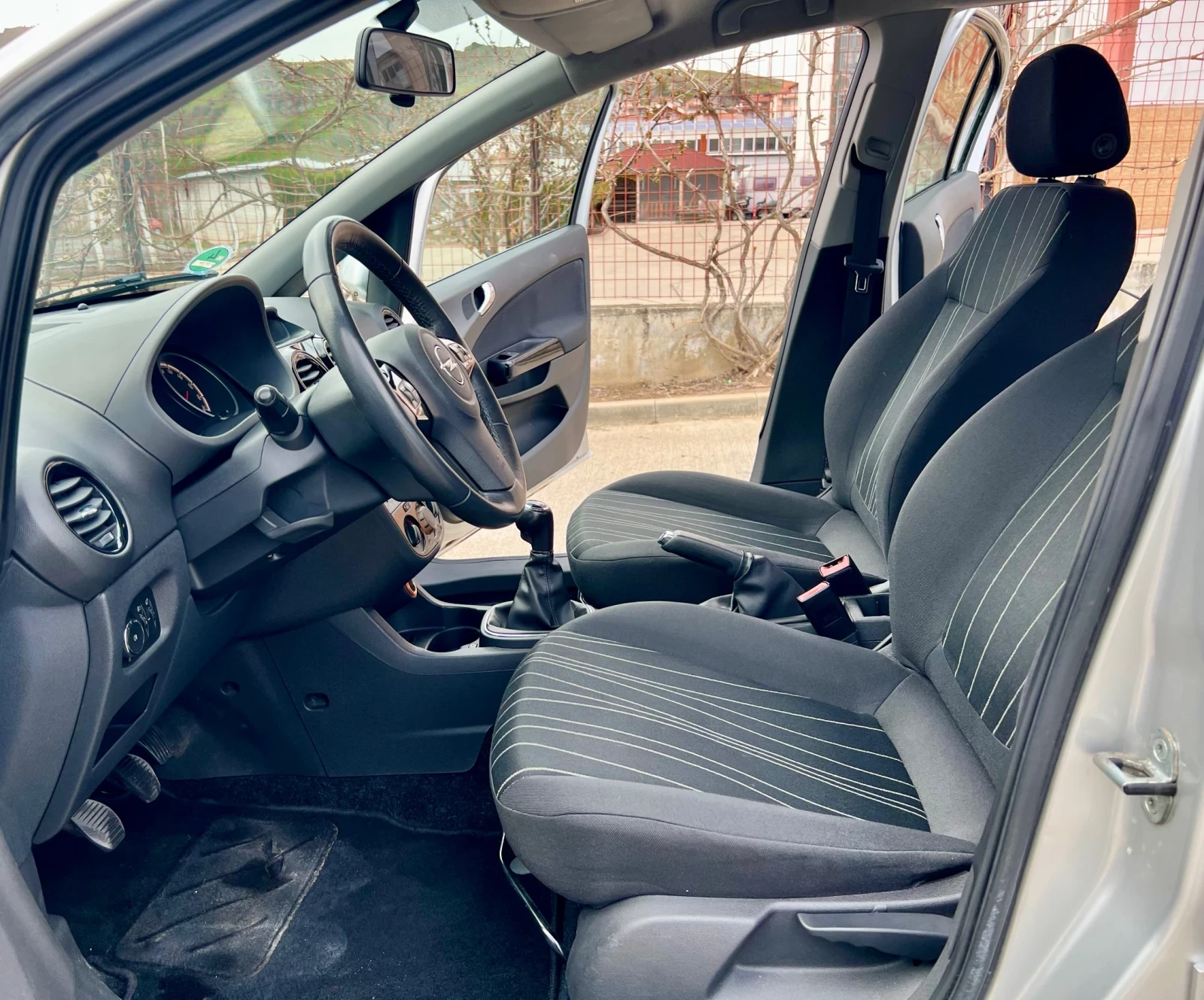 Opel Corsa D1.4, снимка 12 - Автомобили и джипове - 54210070