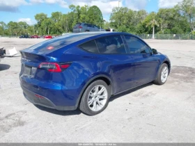 Tesla Model Y STANDARD RANGE REAR-WHEEL DRIVE - 33800 лв. / 17281.67 € - 70598081 4