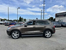 VW Touareg * NAVIGATION| PARKING SENSORS * CARFAX , снимка 3 - Автомобили и джипове - 53695798