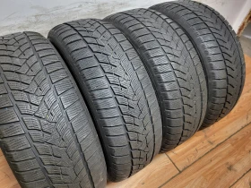 Гуми Зимни 235/65R17, снимка 1 - Гуми и джанти - 48202911