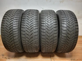 Гуми Зимни 235/65R17, снимка 2 - Гуми и джанти - 48202911