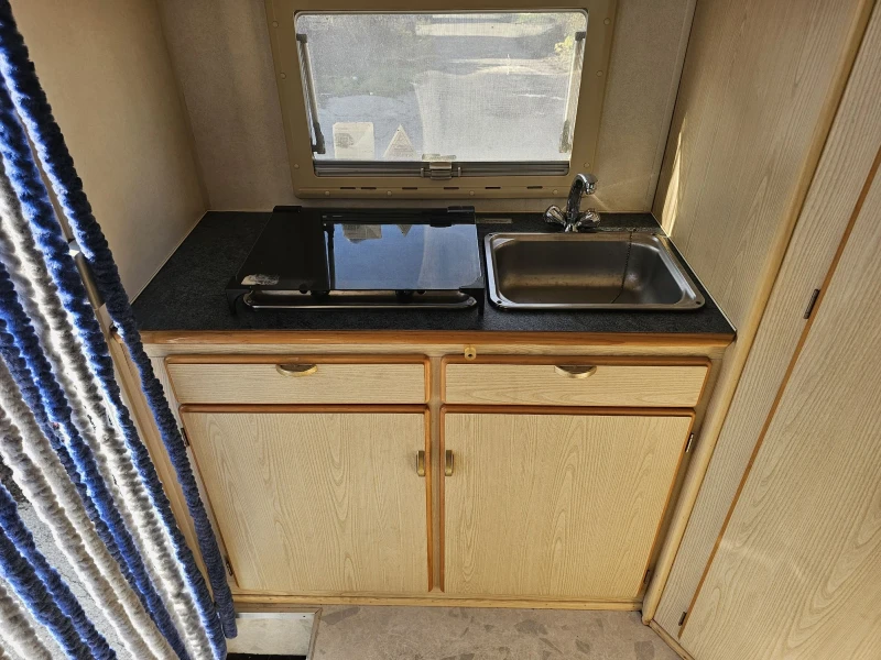 Кемпер Euramobil 2.5 TD, снимка 16 - Каравани и кемпери - 52535853