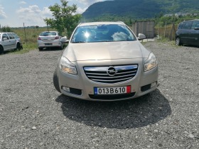 Opel Insignia 1.8i 140ks 2009G, снимка 16 - Автомобили и джипове - 44177073