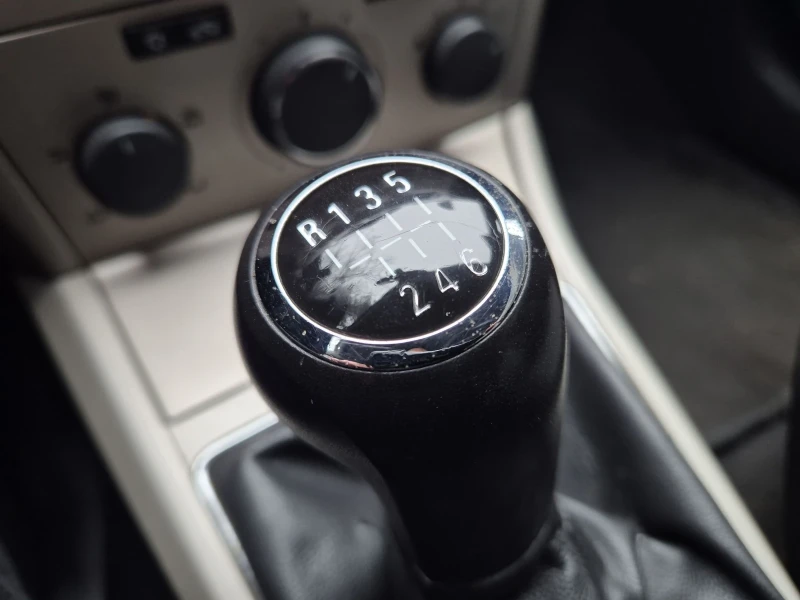 Opel Astra 1.7DCTI CUPE!, снимка 17 - Автомобили и джипове - 53057573