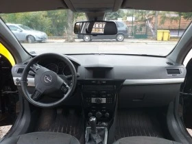 Opel Astra 1.9-120кс 6-скорости, снимка 9