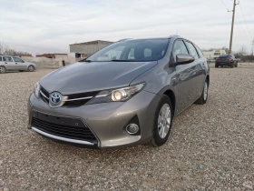 Обява за продажба на Toyota Auris TOYOTA AURIS HYBRID 1.8 ~16 600 лв. - изображение 1