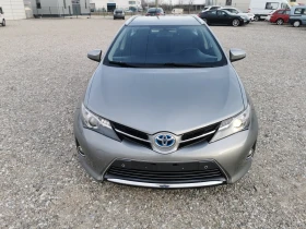 Обява за продажба на Toyota Auris TOYOTA AURIS HYBRID 1.8 ~16 600 лв. - изображение 1