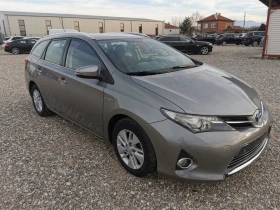 Обява за продажба на Toyota Auris TOYOTA AURIS HYBRID 1.8 ~16 600 лв. - изображение 2