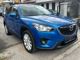 Mazda CX-5 2.0i-4X4-AUTOMAT-NAVI-BOSE-КОЖА-CAMERA-PDC-EURO5B - 9998 € / 19554.39 лв. - 58602021 3