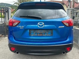 Mazda CX-5 2.0i-4X4-AUTOMAT-NAVI-BOSE-КОЖА-CAMERA-PDC-EURO5B - 9998 € / 19554.39 лв. - 58602021 5