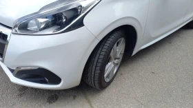 Peugeot 208 1.2i 82к.с., снимка 11